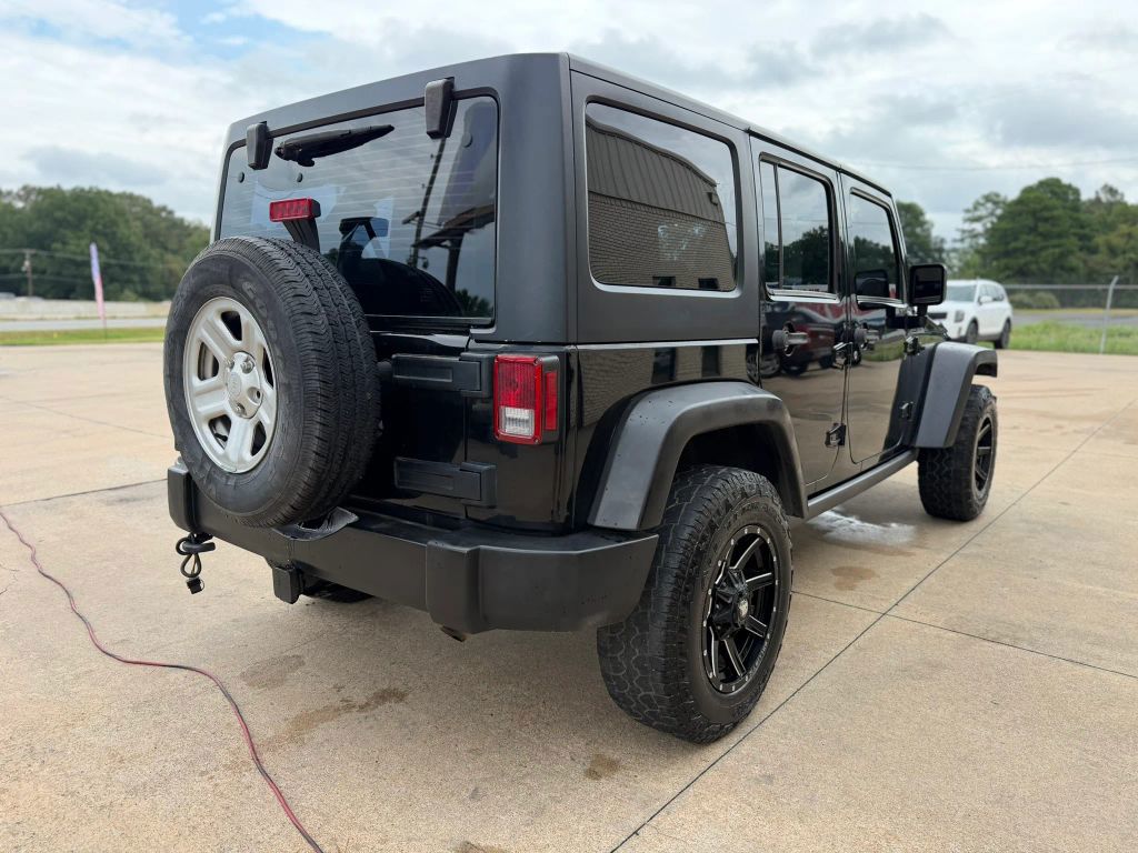 2016 Jeep Wrangler Unlimited Sport S Sport Utility 4D photo 3